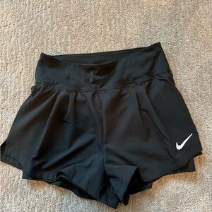 Nike black tennis shorts with built in spandex NEVER BEEN WORN